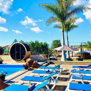 Сasa de vacaciones Privado Serendipia Natural Club Exclusive, Buzanada